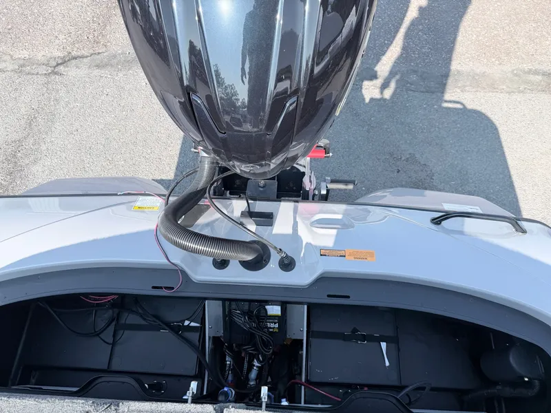 Slide: The Image of Top view of the engine area of a Skeeter ZXR20 SE boat. - 9