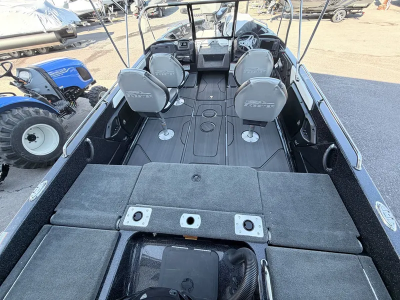 Slide: The Image of The image shows the interior of a 2025 Skeeter Solera 205 boat with four seats. - 30