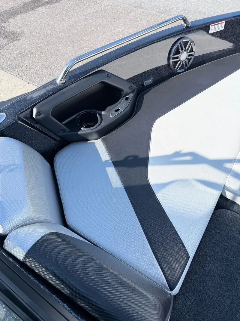 Slide: The Image of The image shows the cockpit of a 2025 Skeeter Solera 205 with modern seating and speakers. - 21