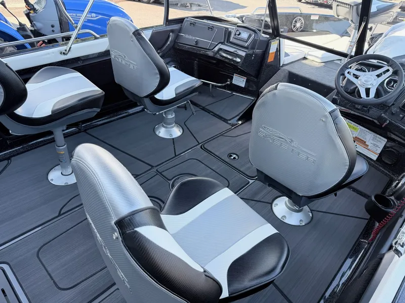 Slide: The Image of Interior view of a Skeeter Solera 205 boat with four swivel seats and a modern dashboard. - 3