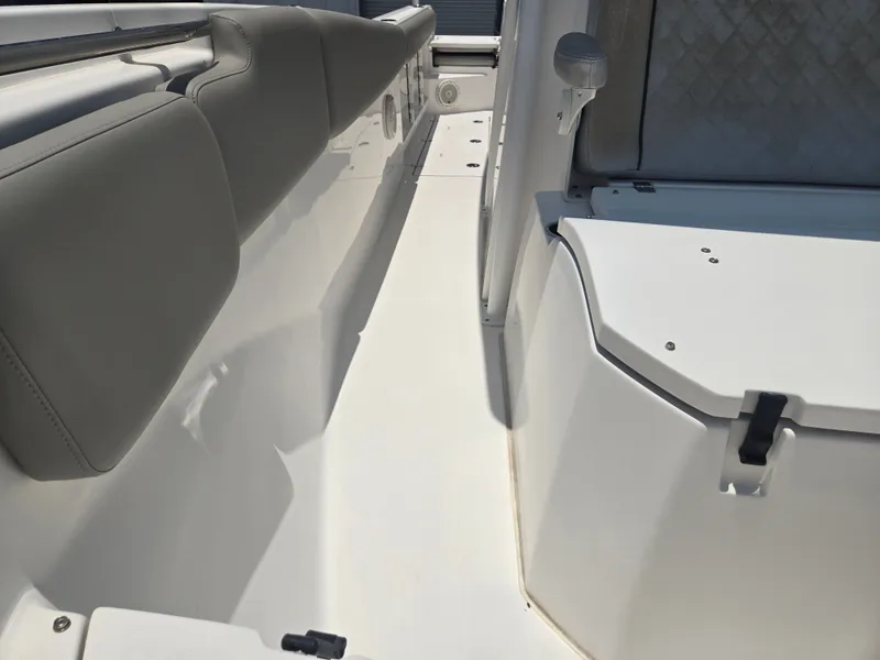 Slide: The Image of Close-up of a Sea Fox 288 Commander boat interior with gray upholstery. - 14