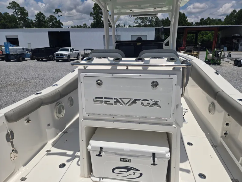 Slide: The Image of The image shows the stern of a Sea Fox 288 Commander boat with a Yeti cooler. - 7