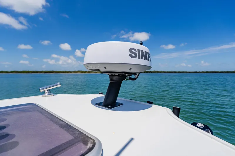 Slide: The Image of 2021 Costa Custom Boats 264HC with Simrad radar on calm waters. - 84