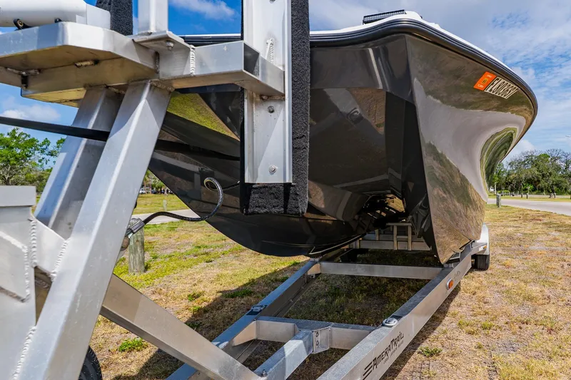 Slide: The Image of 2021 Costa Custom Boats 264HC on trailer, showcasing sleek hull design and sturdy construction. - 6