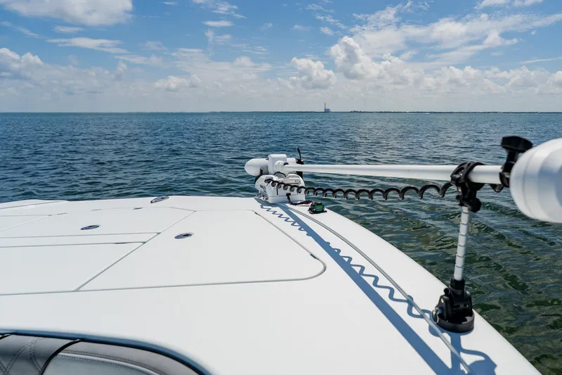 Slide: The Image of Bow of 2021 Costa Custom Boats 264HC on open water under blue sky. - 36
