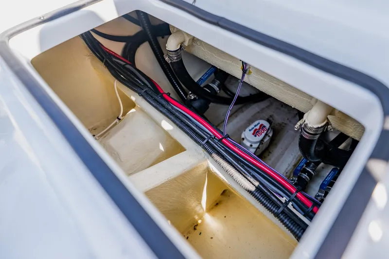 Slide: The Image of 2021 Costa Custom Boats 264HC interior wiring and plumbing details. - 96
