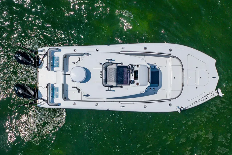 Slide: The Image of Overhead view of 2021 Costa Custom Boats 264HC on green water. - 98