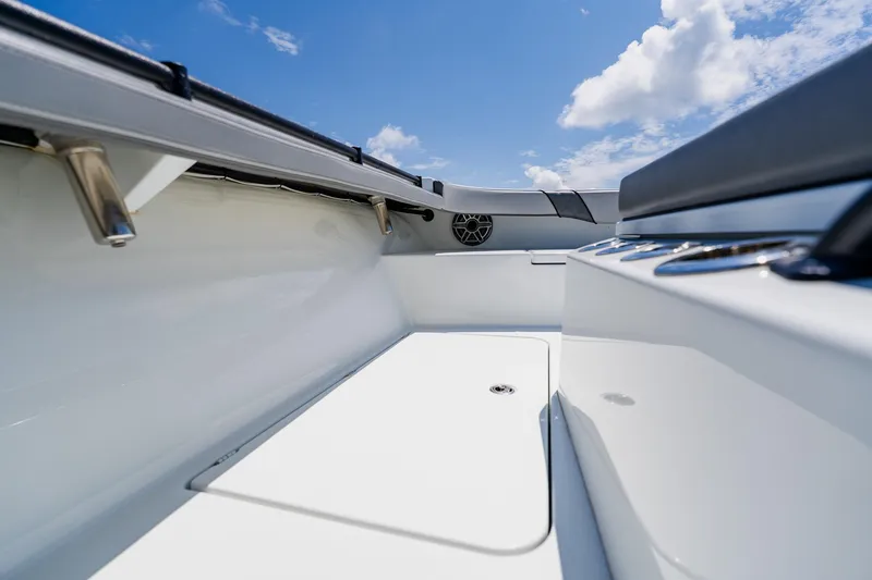 Slide: The Image of 2021 Costa Custom Boats 264HC interior with sleek design under blue sky. - 42