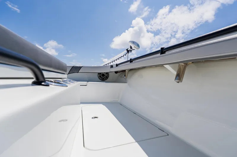 Slide: The Image of 2021 Costa Custom Boats 264HC interior with clear sky background. - 41