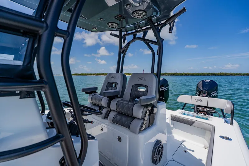 Slide: The Image of 2021 Costa Custom Boats 264HC interior with seating and ocean view. - 64