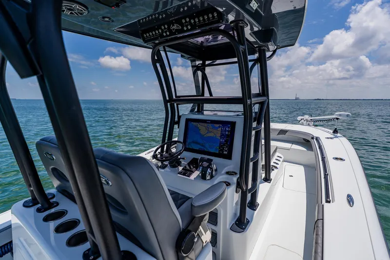 Slide: The Image of 2021 Costa Custom Boats 264HC on open water, featuring advanced navigation system and sleek design. - 61