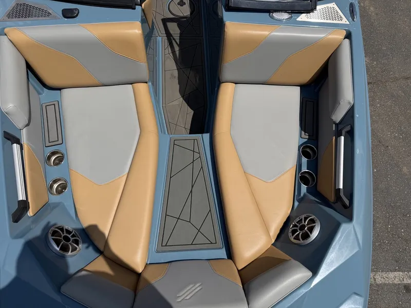 Slide: The Image of Interior view of a 2021 ATX 22 Type-S boat with beige and gray seating. - 22