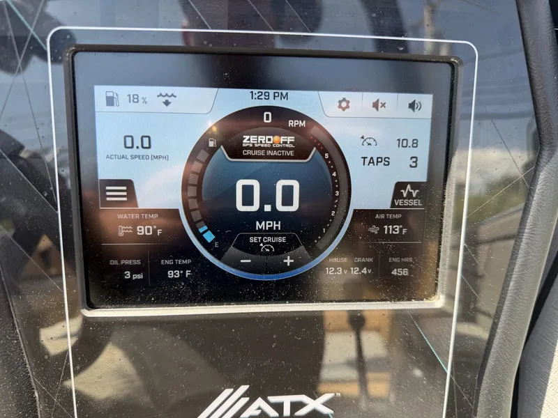 Slide: The Image of The image shows the dashboard of a 2021 ATX 22 Type-S boat with various gauges. - 23