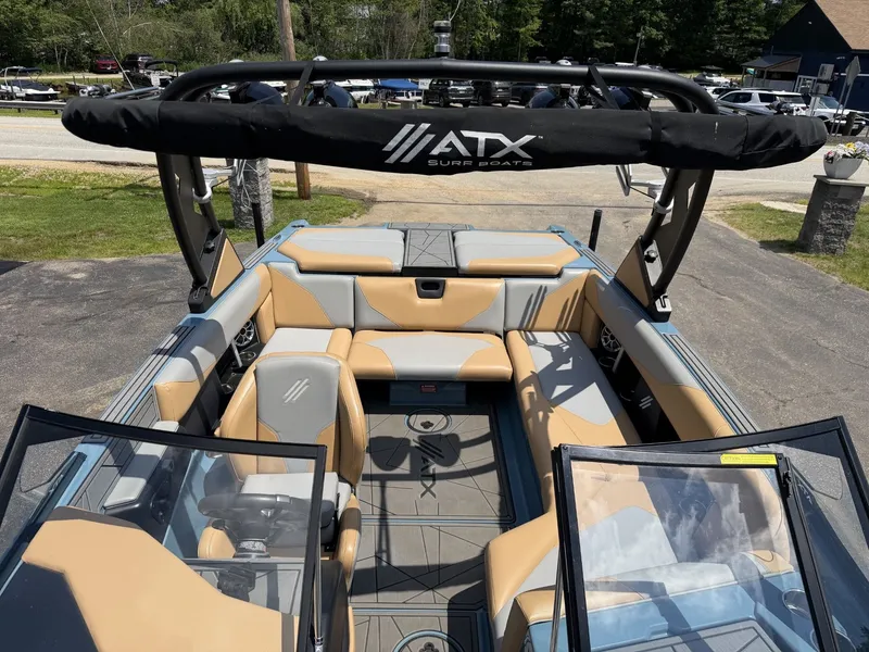 Slide: The Image of Interior view of a 2021 ATX 22 Type-S boat with beige and gray seating. - 17