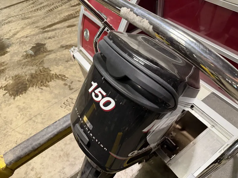 Slide: The Image of Close-up of an outboard motor labeled "150" on a boat. - 19