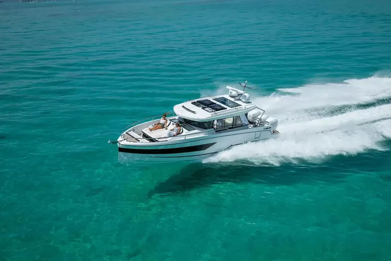 The Image of Wellcraft 38 Explorer 2027 on clear water, featuring a sun deck and modern design. - 1