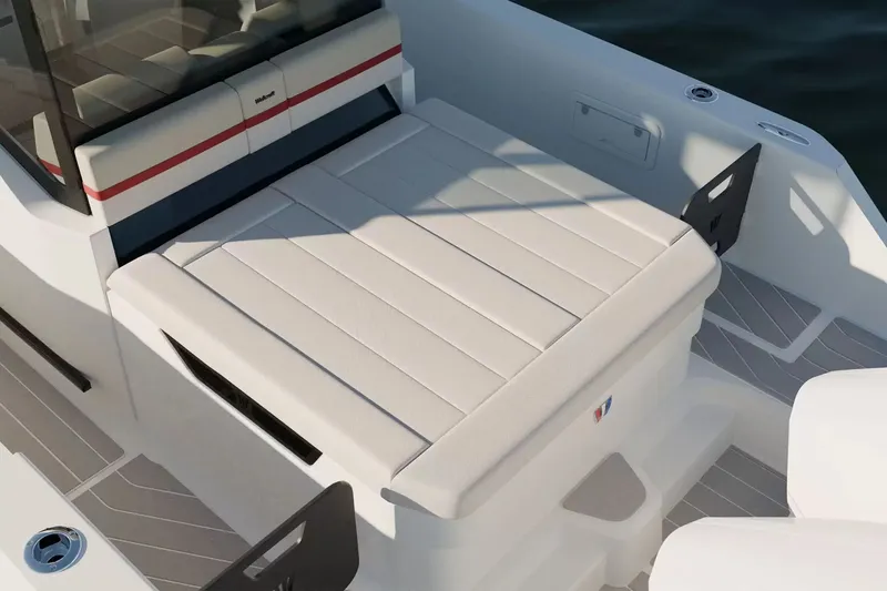 Slide: The Image of The image shows the cockpit of a Wellcraft 28 Explorer with cushioned seating and modern details. - 14