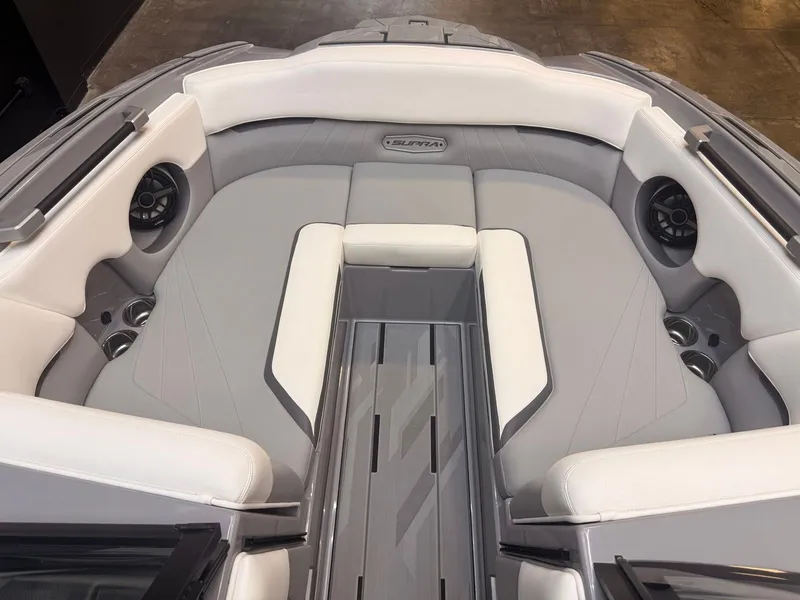 Slide: The Image of The image shows the interior of a 2022 Supra SA boat with gray and white upholstery. - 5