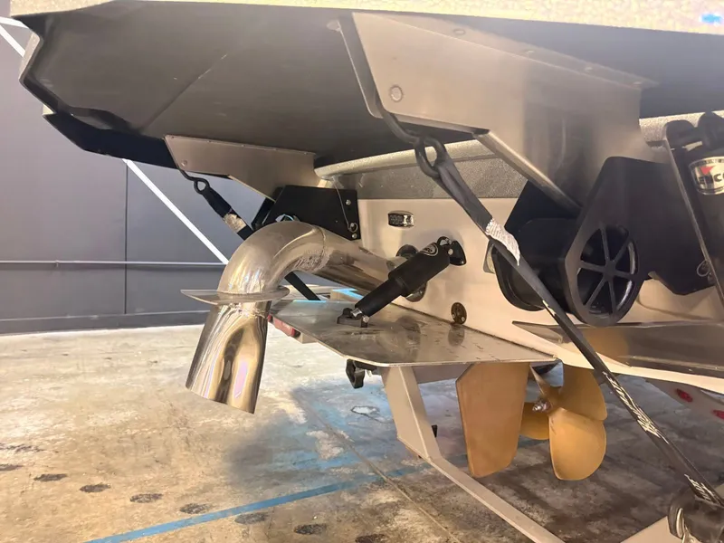 Slide: The Image of Close-up of the rear of a 2022 Supra SA with exhaust and propeller. - 4