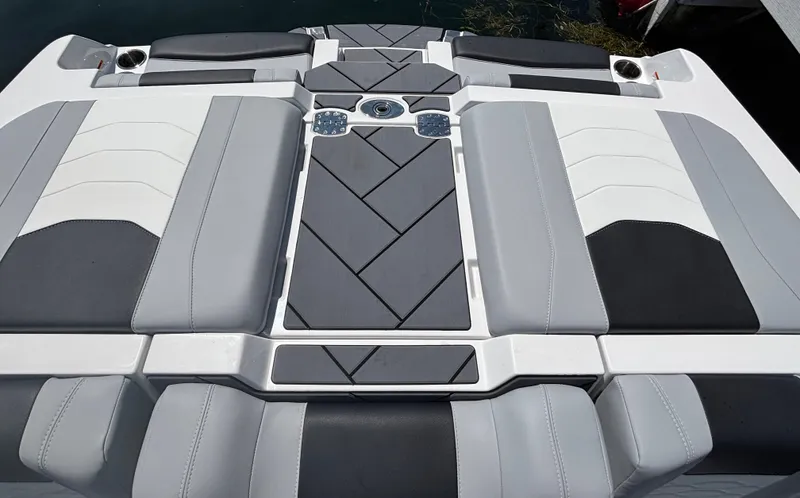 Slide: The Image of The image shows the stern of a 2026 Malibu Wakesetter 23 LSV with stylish upholstery. - 894