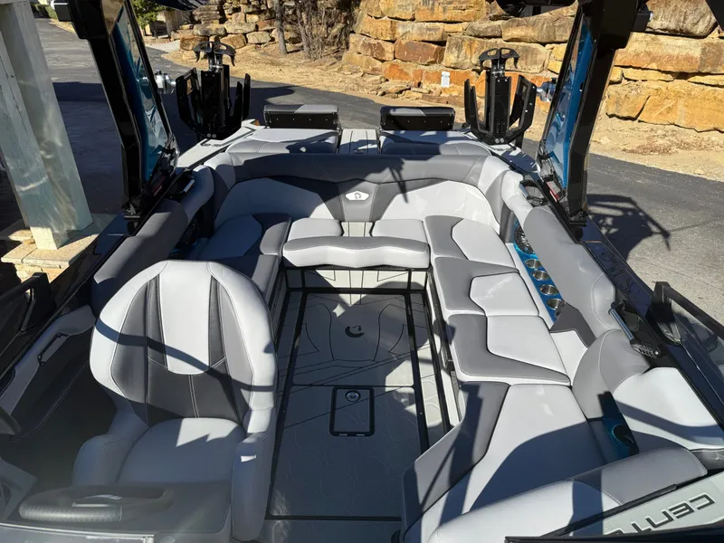 Slide: The Image of Interior of a 2026 Centurion Fe22 with gray upholstery and modern features. - 18