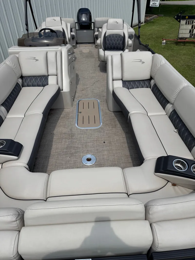 Slide: The Image of 2019 Bennington 25RSR with luxurious seating and modern design. - 6