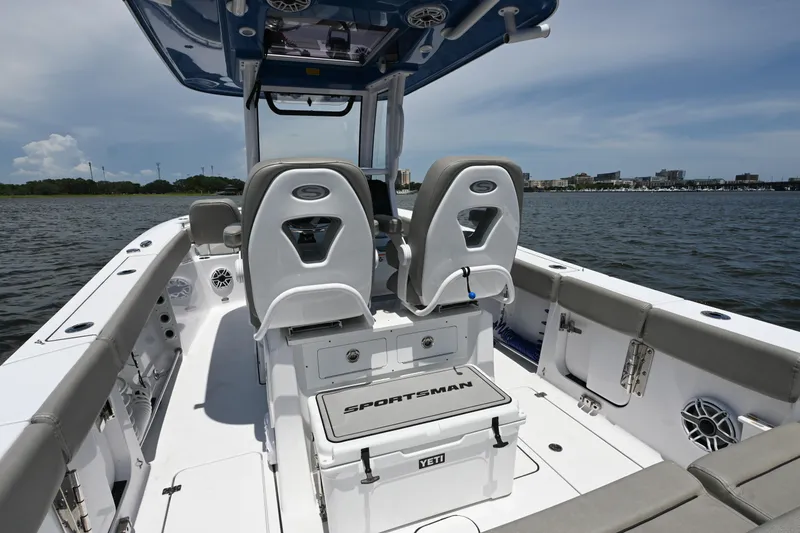 Slide: The Image of 2025 Sportsman Heritage 261 Center Console boat interior on calm water. - 20