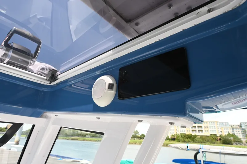 Slide: The Image of 2025 Sportsman Heritage 261 Center Console interior with speaker and control panel. - 10
