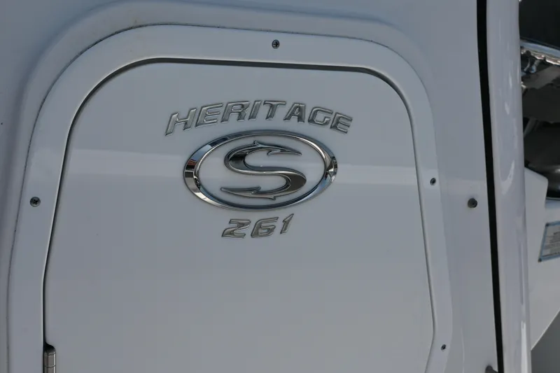Slide: The Image of 2025 Sportsman Heritage 261 Center Console emblem on white surface. - 28
