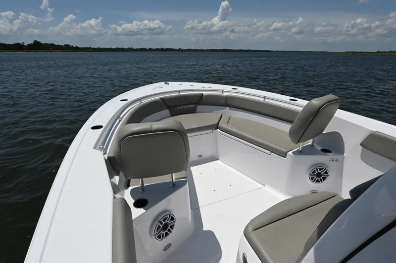 Slide: The Image of 2025 Sportsman Heritage 261 Center Console boat interior on calm water. - 13