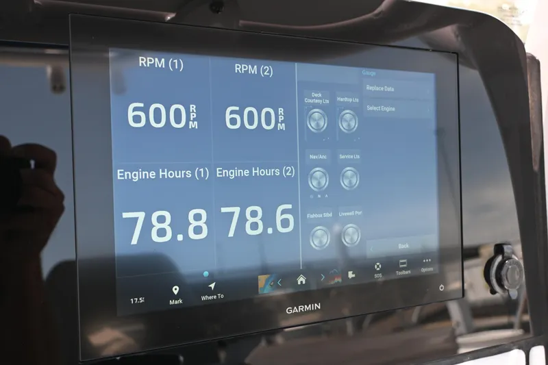 Slide: The Image of Garmin display on a Sportsman Heritage 261 Center Console boat. - 26