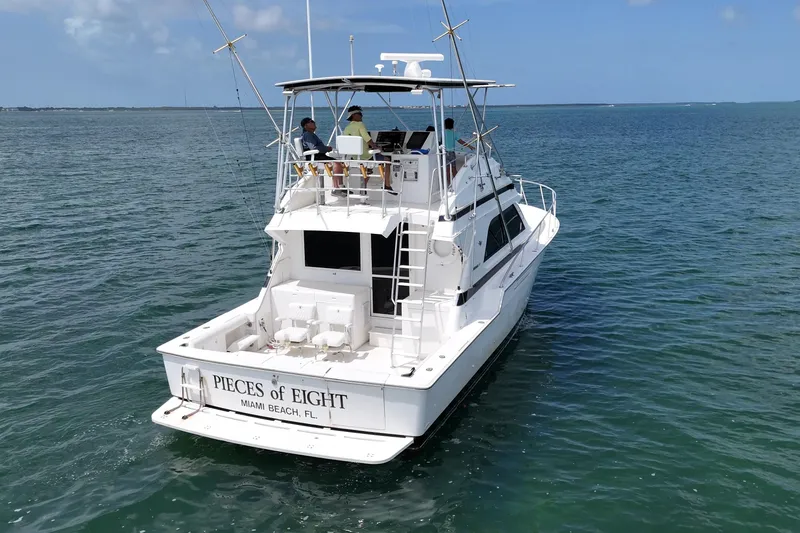 Slide: The Image of 1989 Bertram 43 Convertible yacht "Pieces of Eight" cruising in Miami Beach waters. - 8