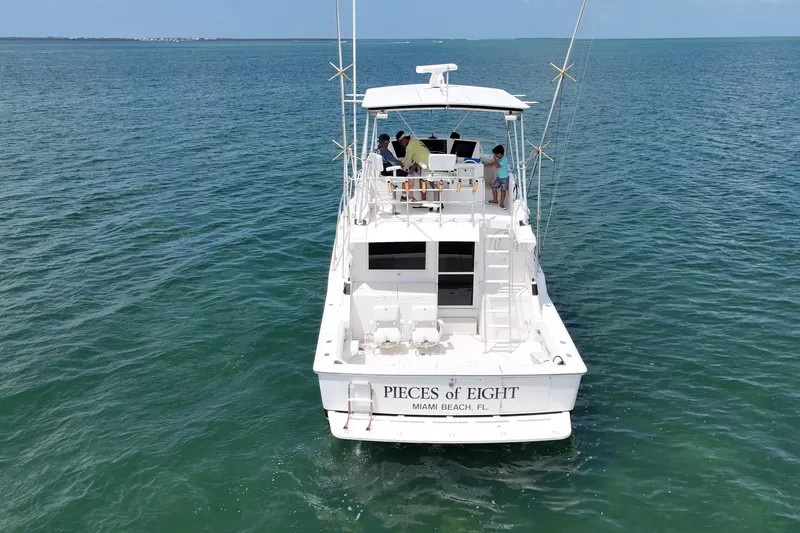 Slide: The Image of 1989 Bertram 43 Convertible yacht on open water, Miami Beach, FL. - 7