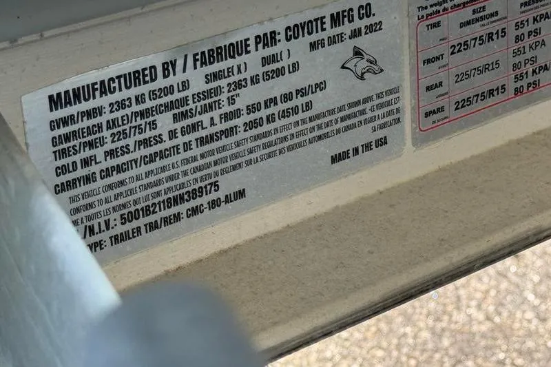 Slide: The Image of Label on 2022 Robalo R180 Center Console, detailing specifications and manufacturing information. - 31