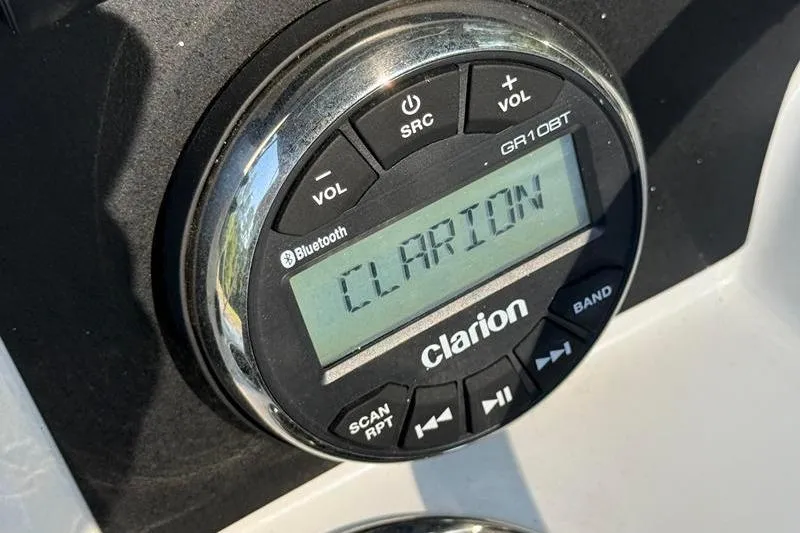 Slide: The Image of Clarion audio system in 2022 Robalo R180 Center Console boat. - 19
