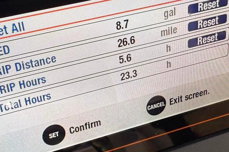 Slide: The Image of Display screen of 2022 Robalo R180 Center Console showing trip data and settings. - 17