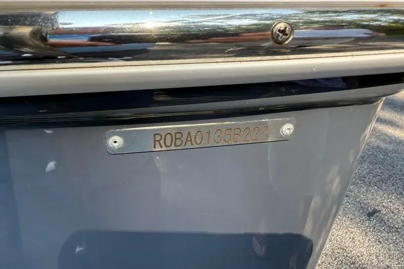 Slide: The Image of 2022 Robalo R180 Center Console boat with visible hull identification number. - 29