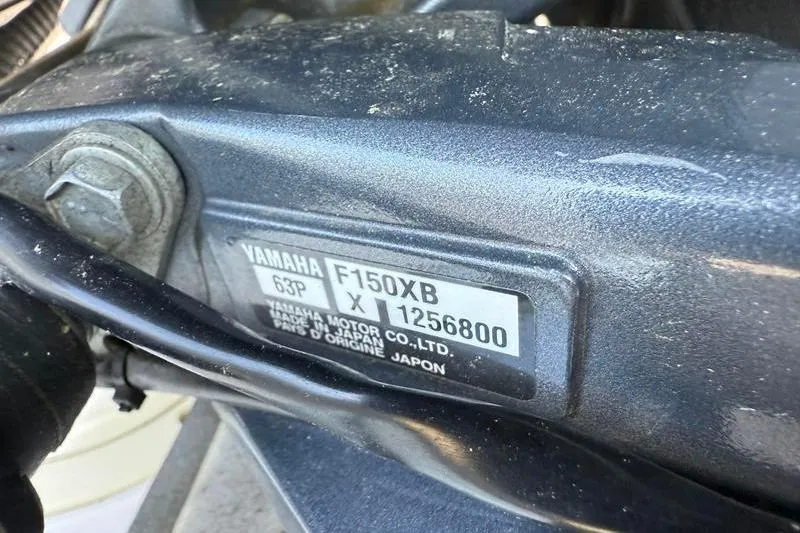 Slide: The Image of Yamaha F150XB engine label on 2022 Robalo R180 Center Console boat. - 30