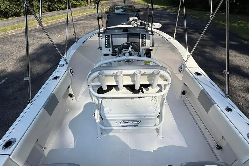 Slide: The Image of 2022 Robalo R180 Center Console boat interior with steering and seating. - 8