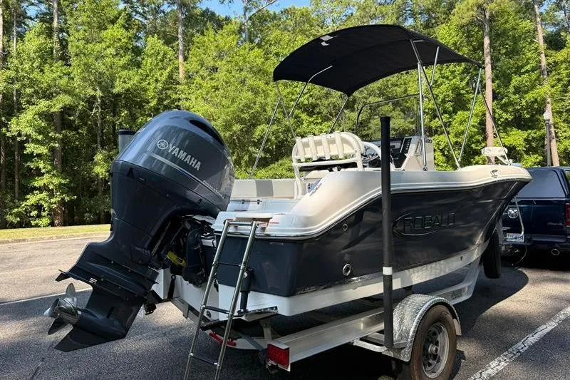 Slide: The Image of 2022 Robalo R180 Center Console boat on trailer with Yamaha outboard motor. - 4
