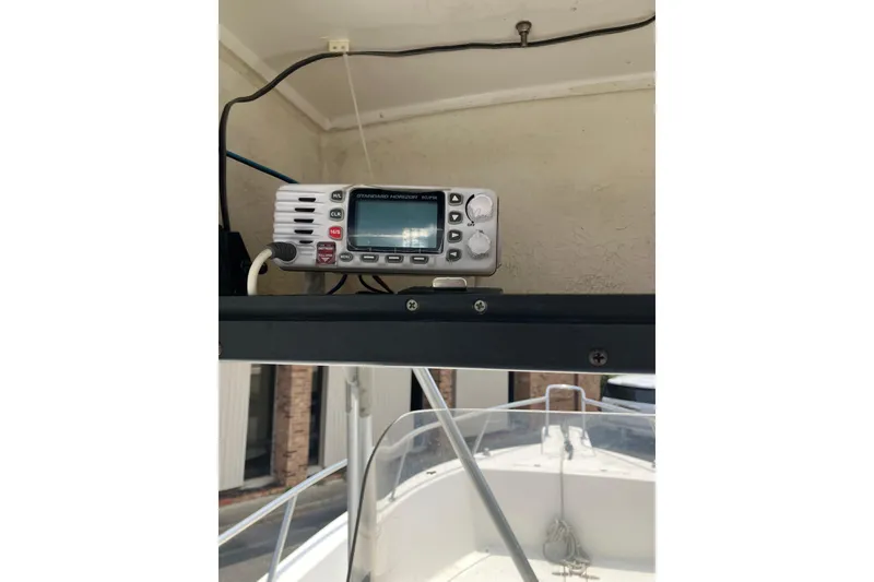 Slide: The Image of 2003 Seapro 239 boat with Standard Horizon marine radio installed on the dashboard. - 9