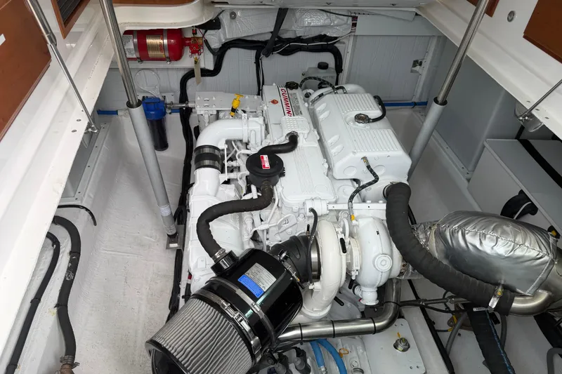 Slide: The Image of Engine room of 2024 Back Cove 372 boat, featuring a Cummins engine. - 82