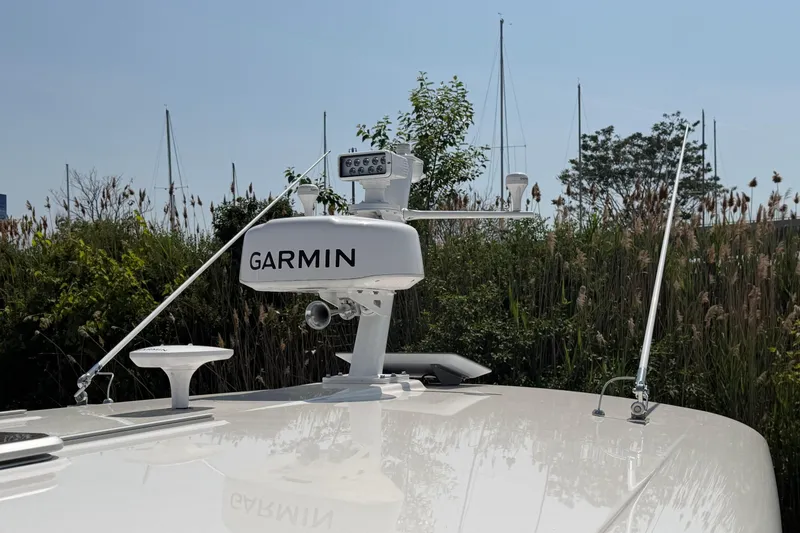 Slide: The Image of 2024 Back Cove 372 boat with Garmin radar system on deck. - 69