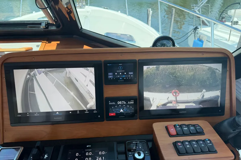Slide: The Image of 2024 Back Cove 372 helm with dual Garmin displays and control panel. - 41