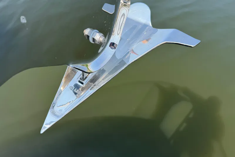 Slide: The Image of Close-up of a shiny anchor on a 2024 Back Cove 372 boat. - 65