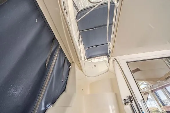 Slide: The Image of Interior view of a 2006 Meridian 341 Sedan boat, featuring sleek design elements. - 6