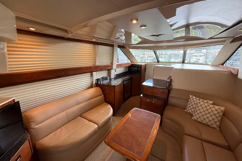 Slide: The Image of Luxurious interior of a 2006 Meridian 341 Sedan yacht with leather seating and modern amenities. - 5