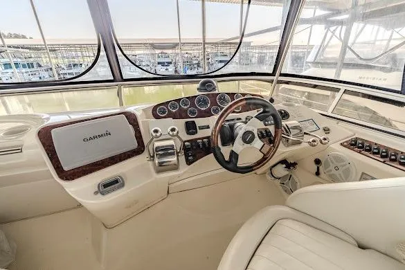 Slide: The Image of Helm of 2006 Meridian 341 Sedan with Garmin navigation system and luxurious controls. - 11