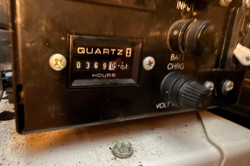 Slide: The Image of Close-up of a 2006 Meridian 341 Sedan engine hour meter reading 3690 hours. - 12