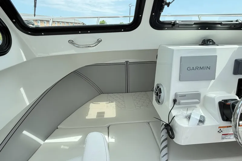 Slide: The Image of Interior of a 2027 Parker 227 Explorer boat with Garmin navigation system. - 18